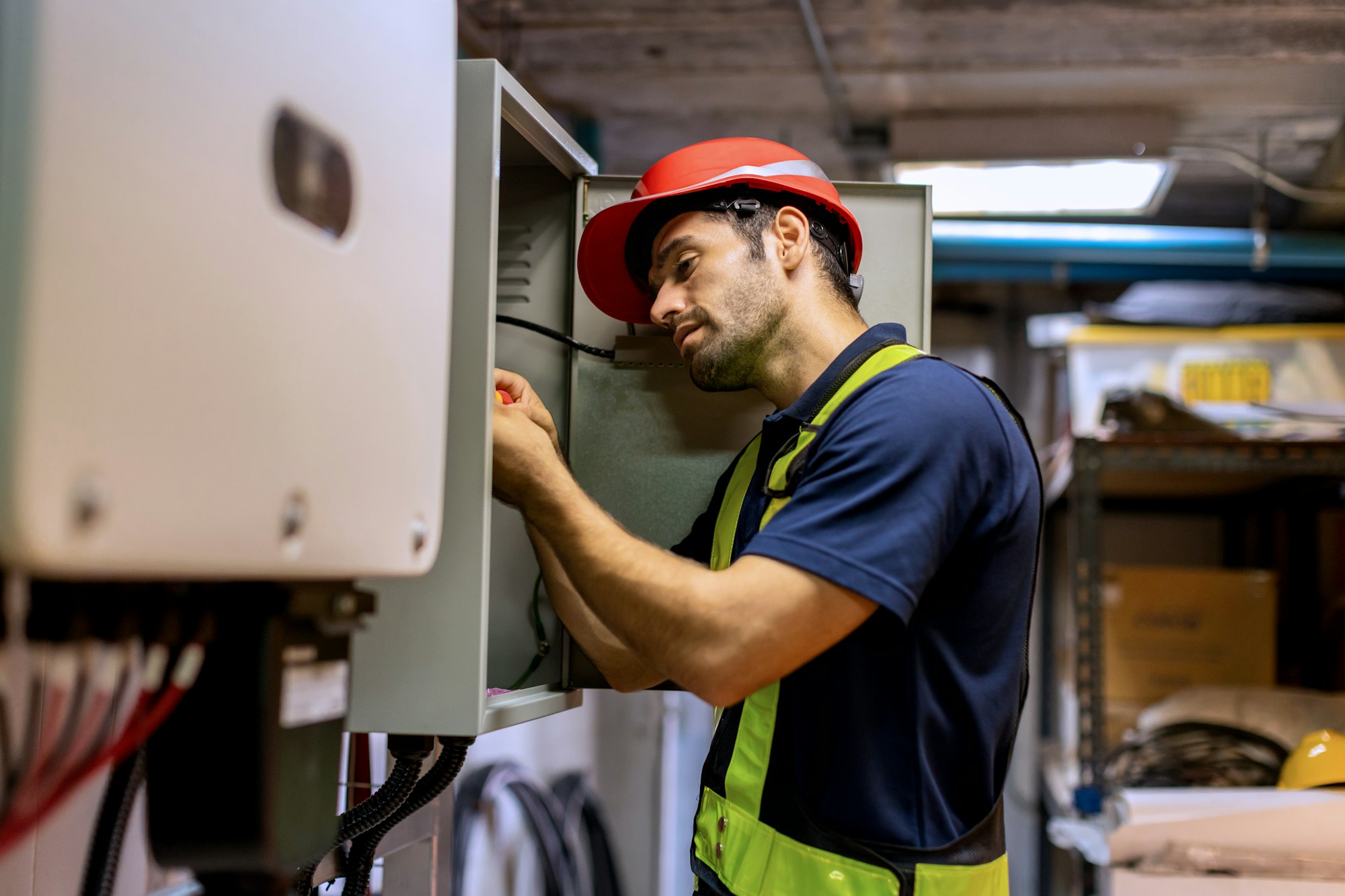 Electrical engineer working in control room.