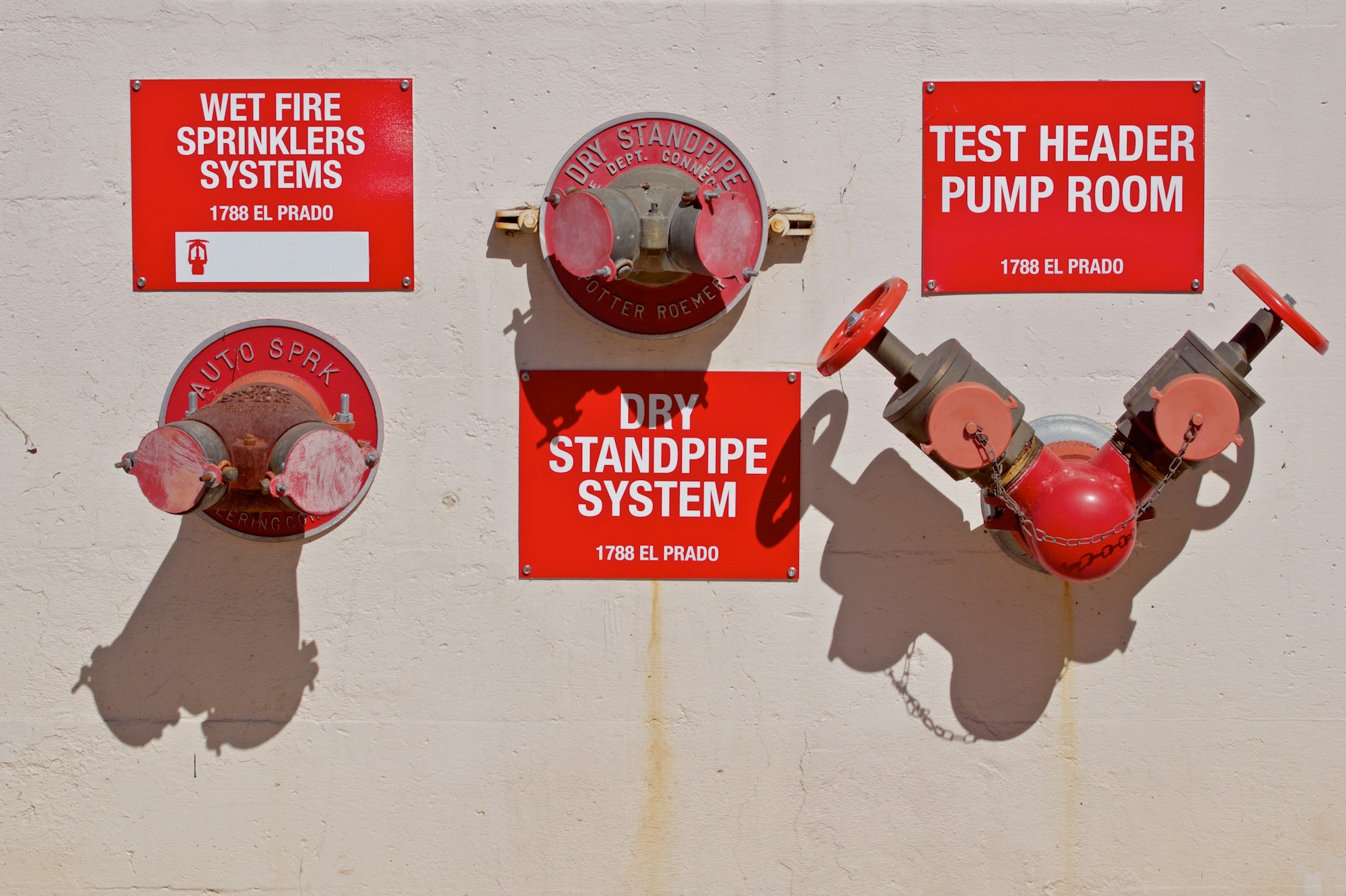 Fire prevention and water sprinkler system to protect building structures from burning down