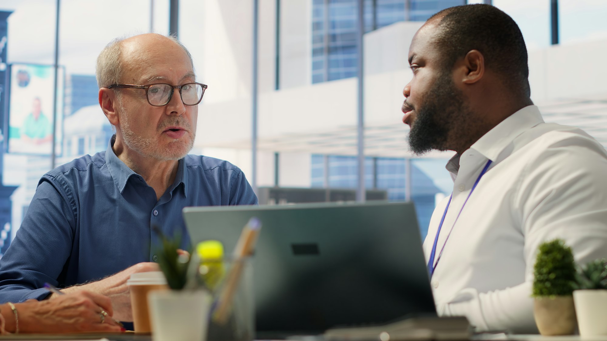 Senior couple in a detailed consultation with a financial advisor